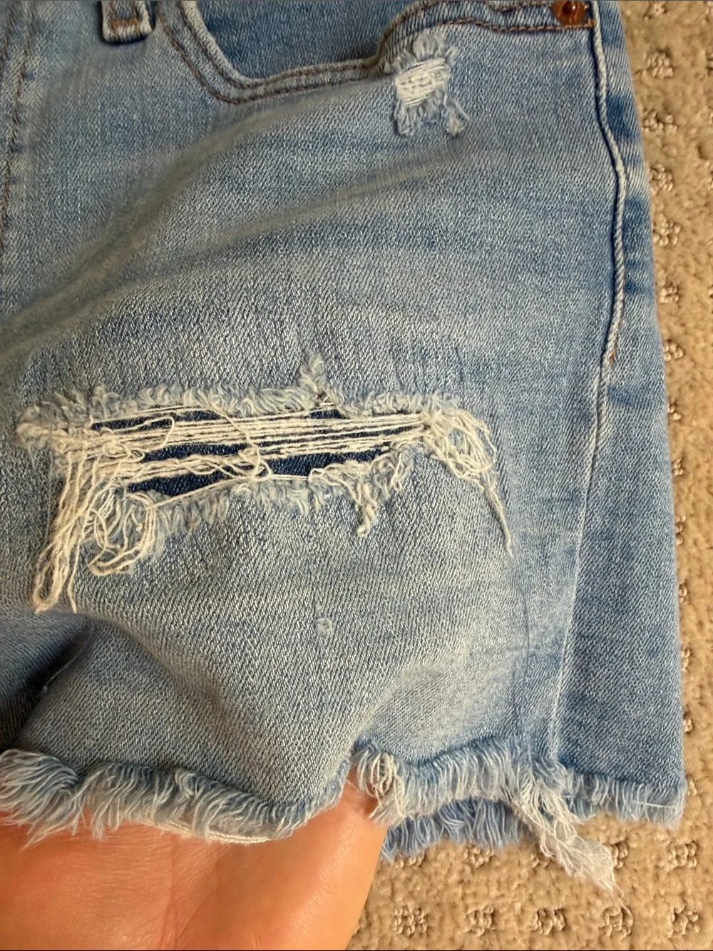 Women’s Levi’s shorts distressed cut off raw hem size 30 fits like a 6 / 27